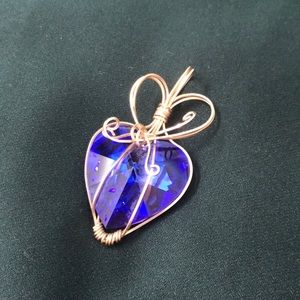 large purple heart pendant with gold